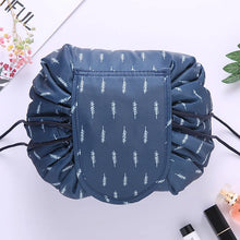 Load image into Gallery viewer, Makeup travel bag Cosmetic organizer Travel beauty essentials Glamourous travel accessory Waterproof makeup pouch Drawstring makeup bag On-the-go beauty organizer Compact travel toiletry bag Stylish cosmetic storage Fashionable functionality bag
